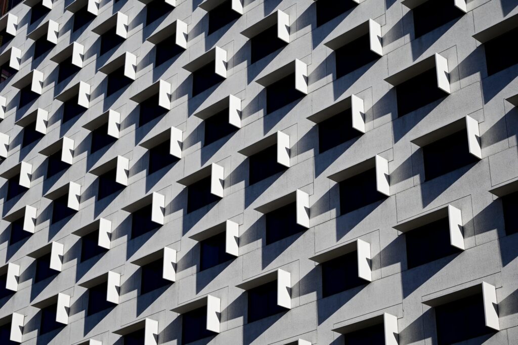 a-modern-multi-storey-residential-building-wall-with-symmetrical-windows