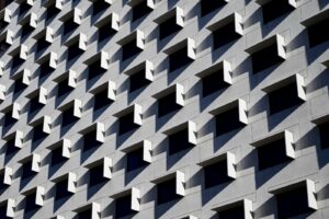 a-modern-multi-storey-residential-building-wall-with-symmetrical-windows