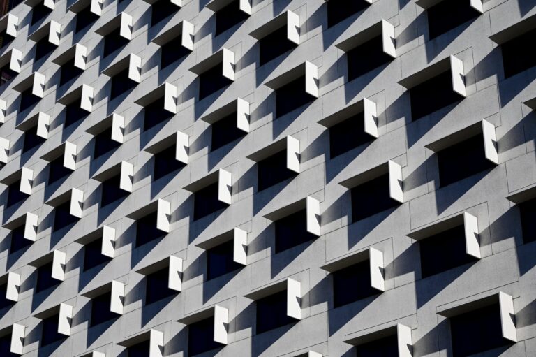 a-modern-multi-storey-residential-building-wall-with-symmetrical-windows